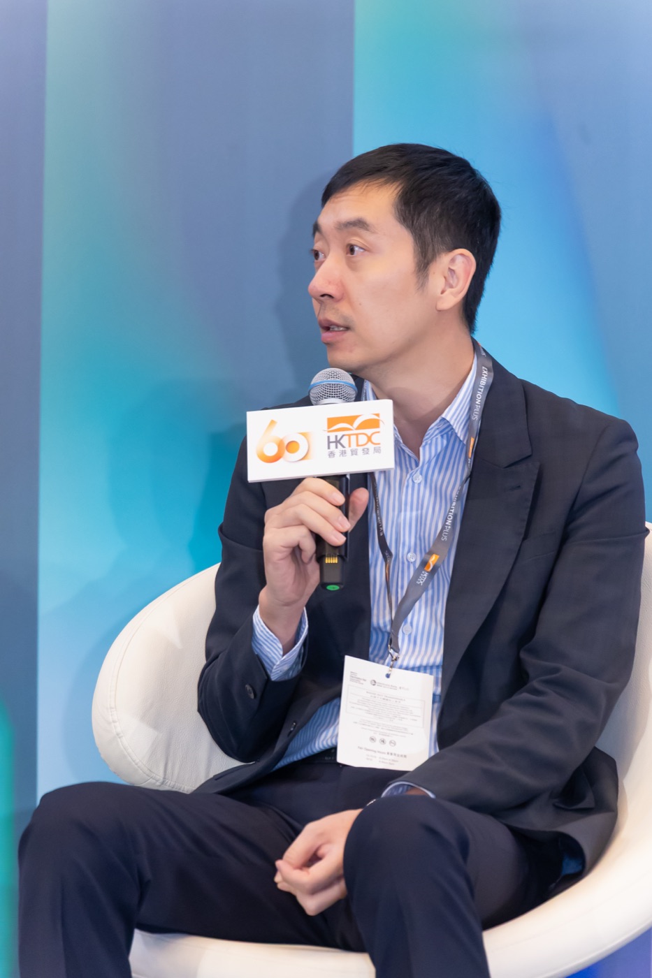 Yayu Wang speaking during the panel discussion